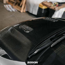 Load image into Gallery viewer, Seibon 2023 Toyota GR Corolla OE-Style Carbon Fiber Hood - Gloss Finish