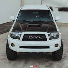 Load image into Gallery viewer, Seibon 05-11 Toyota Tacoma TR-Style Carbon Fiber Hood