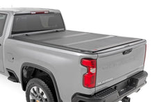 Load image into Gallery viewer, Hard Tri-Fold Flip Up Bed Cover | 6'9" Bed | Chevy/GMC  Silverado/Sierra 2500HD/3500HD (20-25)