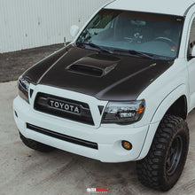 Load image into Gallery viewer, Seibon 05-11 Toyota Tacoma TR-Style Carbon Fiber Hood