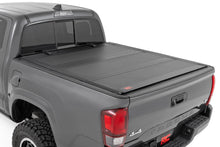 Load image into Gallery viewer, Hard Tri-Fold Flip Up Bed Cover | 6&#39; Bed | Toyota Tacoma (16-23)