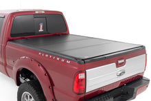 Load image into Gallery viewer, Hard Tri-Fold Flip Up Bed Cover | 6&#39;10&quot; Bed | Ford F-250/F-350 Super Duty (08-16)